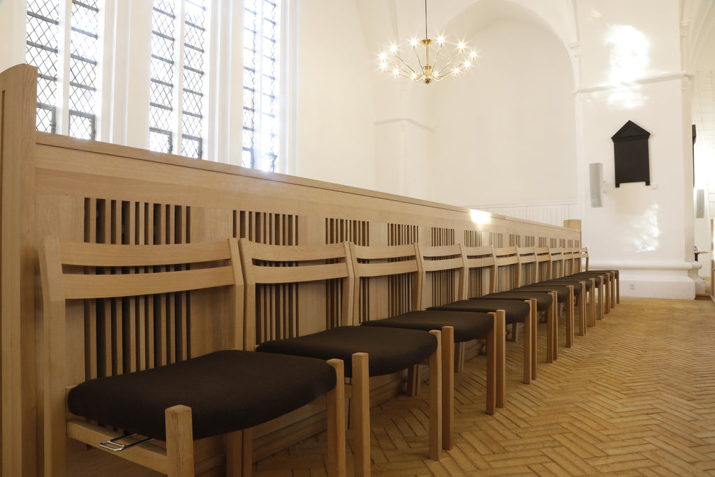 Silkeborg Church features model 404 in oak with a fabric seat